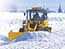 Wheel loader which removes snow