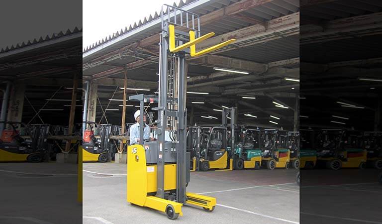 Forklift that is operated standing up (Reach fork)