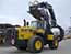 Wheel loader that carries logs to high places (High lift log grapple)