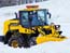 Wheel loader which removes snow